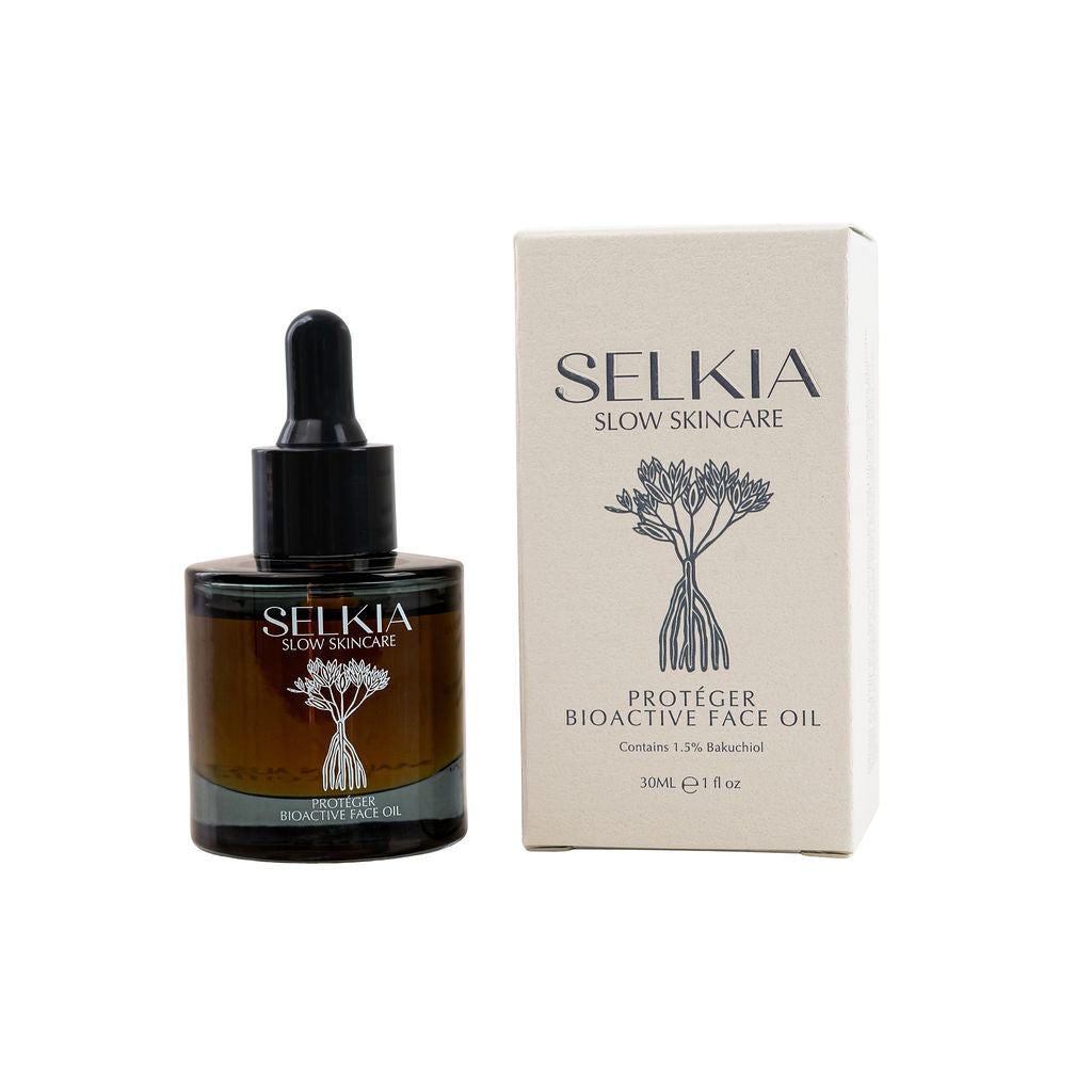 Selkia skincare oil bottle and packaging on a white background